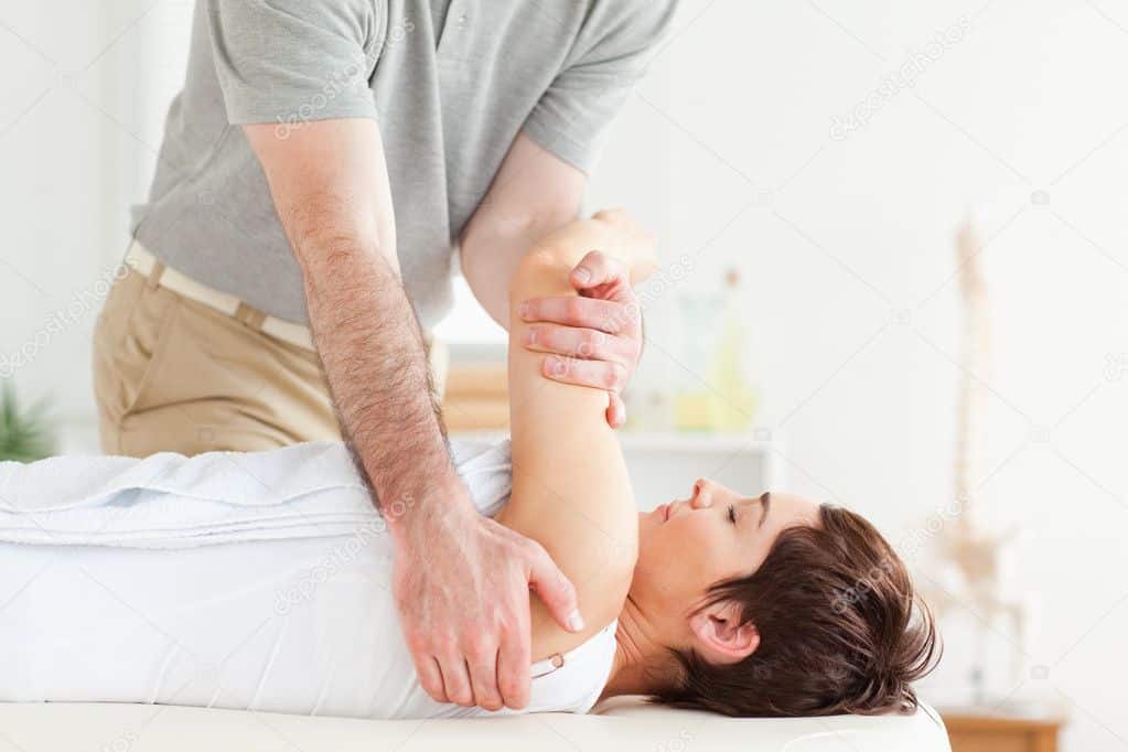 stretching a womans arm